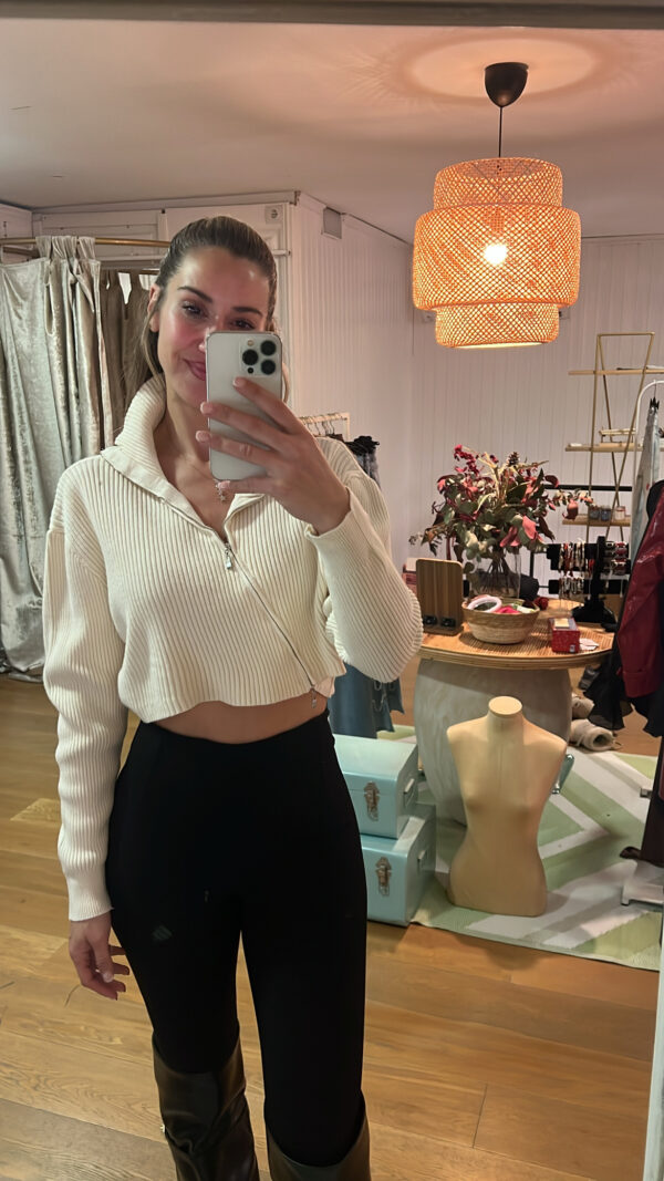 Suéter con cremallera cruzada bone